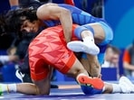 Paris 2024 Olympics - Wrestling - Women's Freestyle 50kg 1/8 Final - Yui Susaki of Japan in action with Vinesh Vinesh of India. 