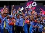 India's head coach Rahul Dravid, center, and Virat Kohli, center right, celebrate with players and team support staff with the winners trophy after defeating South Africa in the ICC Men's T20 World Cup final.(PTI) India's head coach Rahul Dravid, center, and Virat Kohli, center right, celebrate with players and team support staff with the winners trophy after defeating South Africa in the ICC Men's T20 World Cup final.(PTI)