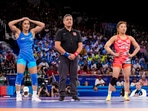 India's Vinesh Phogat reacts after the round of 16 of the women's freestyle 50kg wrestling match against Japan's Yui Susaki