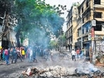 Smoke billows near burnt Awami League party office as anti-government protestors set fire in Dhaka on Tuesday. (AFP) Smoke billows near burnt Awami League party office as anti-government protestors set fire in Dhaka on Tuesday. (AFP)