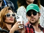 Eva Mendes and her partner Ryan Gosling attend the artistic gymnastics women's uneven bars final during the Paris 2024 Olympic Games at the Bercy Arena in Paris, on August 4, 2024. (Photo by Loic VENANCE / AFP)(AFP) Eva Mendes and her partner Ryan Gosling attend the artistic gymnastics women's uneven bars final during the Paris 2024 Olympic Games at the Bercy Arena in Paris, on August 4, 2024. (Photo by Loic VENANCE / AFP)(AFP)