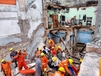 Two houses collapse near Kashi Vishwanath temple; 3 feared trapped, 5 rescued Two houses collapse near Kashi Vishwanath temple; 3 feared trapped, 5 rescued