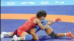 Vinesh Phogat and Yusneylys Guzman Lopez compete in the 50kg semi-final of the Paris Olympics. (PTI) Vinesh Phogat and Yusneylys Guzman Lopez compete in the 50kg semi-final of the Paris Olympics. (PTI)