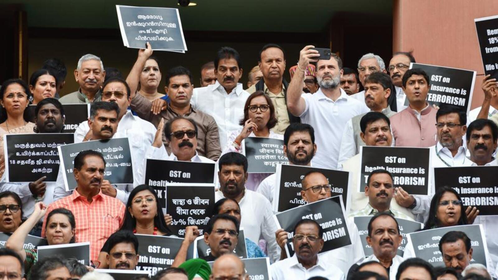 INDIA bloc leaders protest at Parliament gate against GST on insurance services