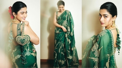 Rashmika Mandanna’s green saree will surely make you the center of attention this Hariyali Teej. Her stunning six yards, adorned with enchanting golden floral embroidery, paired with a matching sleeveless sweetheart neckline blouse with a deep back, is a total stunner. (Instagram/@rashmika_mandanna) Rashmika Mandanna’s green saree will surely make you the center of attention this Hariyali Teej. Her stunning six yards, adorned with enchanting golden floral embroidery, paired with a matching sleeveless sweetheart neckline blouse with a deep back, is a total stunner. (Instagram/@rashmika_mandanna)