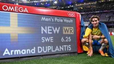 Armand Duplantis celebrates setting the new world record. (AFP) Armand Duplantis celebrates setting the new world record. (AFP)