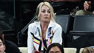 Romanian former gymnast Nadia Comaneci (C) attends the artistic gymnastics women's team final during the Paris 2024 Olympic Games at the Bercy Arena in Paris, on July 30, 2024. (Photo by Anne-Christine POUJOULAT / AFP) (AFP) Romanian former gymnast Nadia Comaneci (C) attends the artistic gymnastics women's team final during the Paris 2024 Olympic Games at the Bercy Arena in Paris, on July 30, 2024. (Photo by Anne-Christine POUJOULAT / AFP) (AFP)
