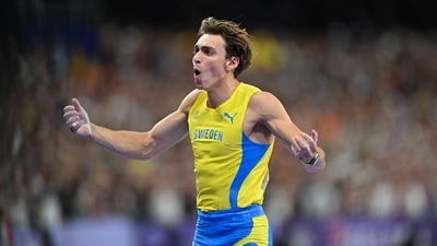 Armand Duplantis of Sweden celebrates after winning gold and establishing a world record. (REUTERS)