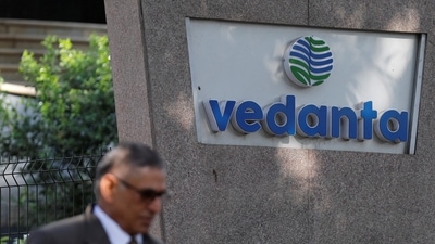 A man walks past the logo of Vedanta outside its headquarters in Mumbai. (Reuters)