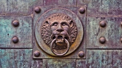 Representative image of a lion-faced door. Representative image of a lion-faced door.