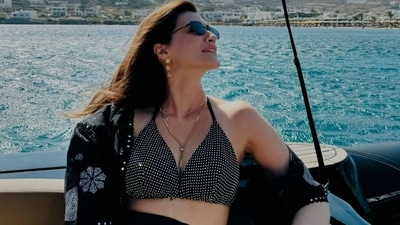Kriti Sanon took a boat ride in Greece as she enjoyed the picturesque spot during her holiday. The actor looked stunning in a black and white bralette teamed with black shrug. She looked happy as she donned her black sunglasses paired with golden earrings and matching necklace. Kriti Sanon took a boat ride in Greece as she enjoyed the picturesque spot during her holiday. The actor looked stunning in a black and white bralette teamed with black shrug. She looked happy as she donned her black sunglasses paired with golden earrings and matching necklace. 