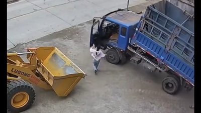 The woman was seen rushing to the truck to stop it. The woman was seen rushing to the truck to stop it.
