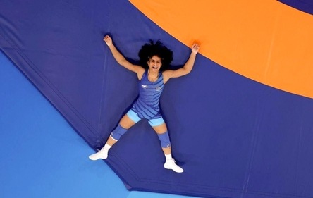 Vinesh Phogat after winning her Women's Freestyle 50kg Round of 16 wrestling match against Japan's Yui Susaki (PTI) Vinesh Phogat after winning her Women's Freestyle 50kg Round of 16 wrestling match against Japan's Yui Susaki (PTI)