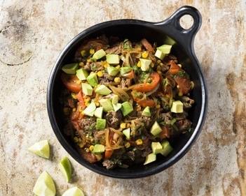 This quick-cooking Chilean sauté of beef and summer produce is comforting yet light. (AP photo) This quick-cooking Chilean sauté of beef and summer produce is comforting yet light. (AP photo)