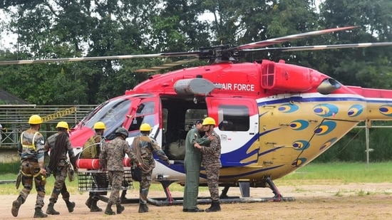 An IAF helicopter along with the Indian Army conducting rescue operation following landslides that led to massive damage in Wayanad district. (PTI)