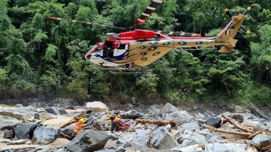 An Indian Air Force helicopter, in joint efforts with the Indian Army, during the seventh day of the rescue operation following landslides that led to massive damage in Wayanad district. (PTI)