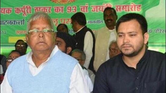 Former railway minister Lalu Prasad Yadav and former Bihar deputy chief minister Tejashwi Yadav. (PTI)