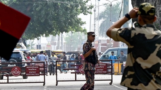 Border Security Force (BSF) personnel stand guard at the India-Bangladesh border of Petrapole about 100km north east of Kolkata.(AFP)