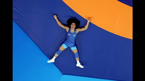 India's Vinesh Phogat reacts after winning the round of 16 women's 50kg wrestling match against Japan's Yui Susaki at the Paris Olympic Games 2024, in Paris on Tuesday. (WFI)