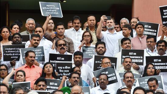 Lok Sabha leader of opposition Rahul Gandhi and INDIA bloc MPs protest in the Parliament complex on Tuesday. (ANI Photo)