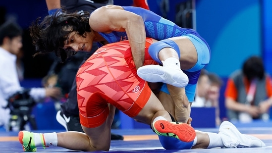 Paris 2024 Olympics - Wrestling - Women's Freestyle 50kg 1/8 Final - Yui Susaki of Japan in action with Vinesh Vinesh of India. (REUTERS)