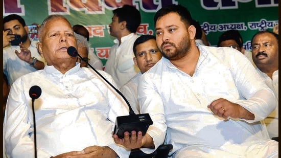 RJD leaders Lalu Prasad and Tejashwi Yadav (Santosh Kumar/HT Photo)