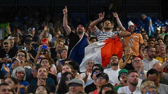 Spectators build the atmosphere ahead of the wrestling events at the Champ-de-Mars Arena during the Paris 2024 Olympic Games. (AFP)