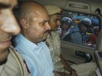 Delhi Police with chief minister Arvind Kejriwal’s aide Bibhav Kumar leave CM's residence after recreation of the scene in AAP MP Swati Maliwal's assault case in May, 2024. (PTI) Delhi Police with chief minister Arvind Kejriwal’s aide Bibhav Kumar leave CM's residence after recreation of the scene in AAP MP Swati Maliwal's assault case in May, 2024. (PTI)