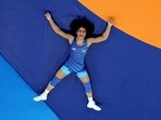 India's Vinesh Phogat reacts after winning the round of 16 women's 50kg wrestling match against Japan's Yui Susaki India's Vinesh Phogat reacts after winning the round of 16 women's 50kg wrestling match against Japan's Yui Susaki