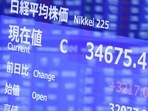 An electric stock board displays the closing price of the Nikkei 225 Stock Average at the Tokyo Stock Exchange (TSE) in Tokyo, Japan. An electric stock board displays the closing price of the Nikkei 225 Stock Average at the Tokyo Stock Exchange (TSE) in Tokyo, Japan.