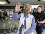 Nobel laureate Muhammad Yunus waves to the media at Charles de Gaulle's airport in Roissy, north of Paris, Wednesday. (AP) Nobel laureate Muhammad Yunus waves to the media at Charles de Gaulle's airport in Roissy, north of Paris, Wednesday. (AP)