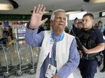 Nobel laureate Muhammad Yunus waves to the media at Charles de Gaulle's airport in Roissy, north of Paris, Wednesday. (AP) Nobel laureate Muhammad Yunus waves to the media at Charles de Gaulle's airport in Roissy, north of Paris, Wednesday. (AP)