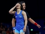 Vinesh Phogat reacts after winning the match against Yui Susaki of Japan.