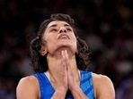 India's Vinesh Phogat reacts after the round of 16 of the women's freestyle 50kg wrestling match against Japan's Yui Susaki, at Champ-de-Mars Arena, during the 2024 Summer Olympics, Tuesday, Aug. 6, 2024, in Paris, France.