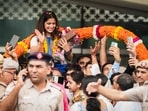 Markswoman Manu Bhaker being welcomed upon her arrival at the airport, in New Delhi, Wednesday, Aug. 7, 2024. Bhaker, India's first to win two Olympic medals in a single edition, arrived Delhi after a successful campaign at the Paris Games 2024