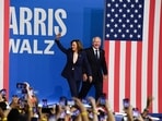 TOPSHOT - US Vice President and 2024 Democratic presidential candidate Kamala Harris and her running mate Minnesota Gorvernor Tim Walz greet their supporters as they arrive at Temple University's Liacouras Center in Philadelphia, Pennsylvania, August 6, 2024, on the first day of their "Battleground State Tour". (Photo by MATTHEW HATCHER / AFP) TOPSHOT - US Vice President and 2024 Democratic presidential candidate Kamala Harris and her running mate Minnesota Gorvernor Tim Walz greet their supporters as they arrive at Temple University's Liacouras Center in Philadelphia, Pennsylvania, August 6, 2024, on the first day of their "Battleground State Tour". (Photo by MATTHEW HATCHER / AFP)