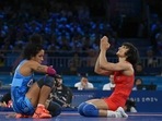 India's Vinesh Vinesh (R) reacts her win over Cuba's Yusneylis Guzman Lopez (L) in their women's freestyle 50kg wrestling semi-final match. India's Vinesh Vinesh (R) reacts her win over Cuba's Yusneylis Guzman Lopez (L) in their women's freestyle 50kg wrestling semi-final match.