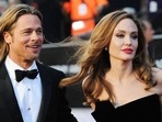 Jolie's attorneys claim Pitt tried to silence her with a non-disclosure agreement, while Pitt's team calls it a 'simple business dispute'