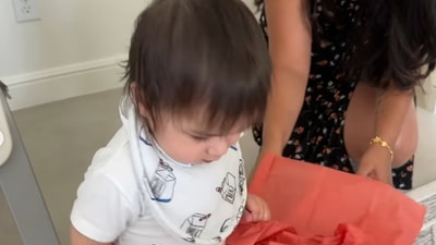 In several other pictures, Koa was seen busy with his toys, playing with his birthday decorations and eating. In several other pictures, Koa was seen busy with his toys, playing with his birthday decorations and eating.