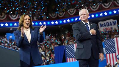 Democratic presidential candidate, US Vice-President Kamala Harris and Democratic vice-presidential candidate Minnesota Governor Tim Walz appear on stage together during a campaign event at Girard College in Philadelphia, Pennsylvania, on Tuesday. (AFP)