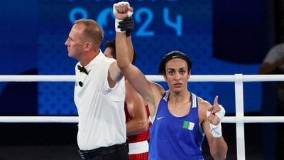 Referee raises the arm of Imane Khelif of Algeria after winning her fight against Janjaem Suwannapheng of Thailand (REUTERS)