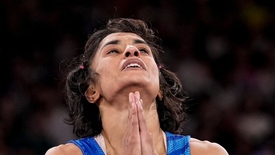 India's Vinesh Phogat reacts after the round of 16 of the women's freestyle 50kg wrestling match against Japan's Yui Susaki, at Champ-de-Mars Arena, during the 2024 Summer Olympics, Tuesday, Aug. 6, 2024, in Paris, France. (PTI) India's Vinesh Phogat reacts after the round of 16 of the women's freestyle 50kg wrestling match against Japan's Yui Susaki, at Champ-de-Mars Arena, during the 2024 Summer Olympics, Tuesday, Aug. 6, 2024, in Paris, France. (PTI)