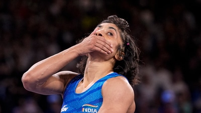 India's Vinesh Phogat reacts after the round of 16 of the women's freestyle 50kg wrestling match against Japan's Yui Susaki, at Champ-de-Mars Arena (PTI) India's Vinesh Phogat reacts after the round of 16 of the women's freestyle 50kg wrestling match against Japan's Yui Susaki, at Champ-de-Mars Arena (PTI)