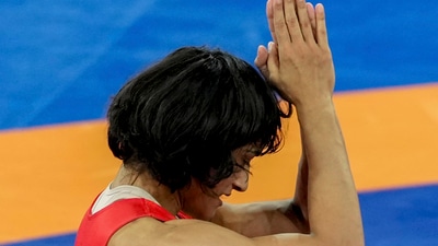 Vinesh Phogat celebrates after winning her Women's Freestyle 50kg semi-final wrestling match against Cuba's Yusneylys Guzman Lopez at the 2024 Summer Olympics, in Paris, (PTI)
