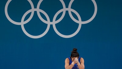 However, she slipped down to fourth at the end of the clean and jerk series with a total lift of 199kg. Mirabai thus missed out on a historic second Olympic medal. (PTI) However, she slipped down to fourth at the end of the clean and jerk series with a total lift of 199kg. Mirabai thus missed out on a historic second Olympic medal. (PTI)