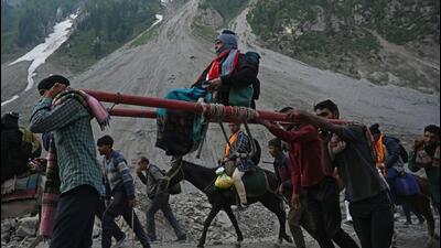 Pilgrims en-route to the cave shrine during the Amarnath Yatra. (Waseem Andrabi/HT) Pilgrims en-route to the cave shrine during the Amarnath Yatra. (Waseem Andrabi/HT)