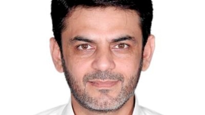 This image provided by the Justice Department, contained in the complaint supporting the arrest warrant, shows Asif Merchant. The Pakistani man alleged to have ties to Iran has been charged in a plot to carry out political assassinations on U.S. soil (AP) This image provided by the Justice Department, contained in the complaint supporting the arrest warrant, shows Asif Merchant. The Pakistani man alleged to have ties to Iran has been charged in a plot to carry out political assassinations on U.S. soil (AP)