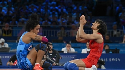 India's Vinesh Vinesh (R) reacts her win over Cuba's Yusneylis Guzman Lopez (L) in their women's freestyle 50kg wrestling semi-final match. (AFP) India's Vinesh Vinesh (R) reacts her win over Cuba's Yusneylis Guzman Lopez (L) in their women's freestyle 50kg wrestling semi-final match. (AFP)