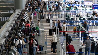 Travellers at Vancouver International Airport in Vancouver, British Columbia, Canada. (Bloomberg) Travellers at Vancouver International Airport in Vancouver, British Columbia, Canada. (Bloomberg)