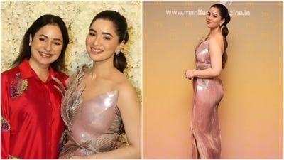 Sara Tendulkar attended an event recently dressed in a one-shoulder gown designed by Amit Aggarwal. She styled the sequinned ensemble with a bubble braid hairdo, pink lips, darkened brows, and statement earrings.&nbsp; (Instagram)